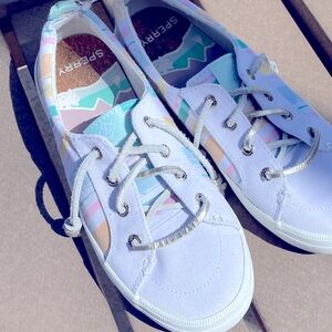 SPERRY women’s size 6/Euro 36 rainbow slip on silver lace sneakers.
